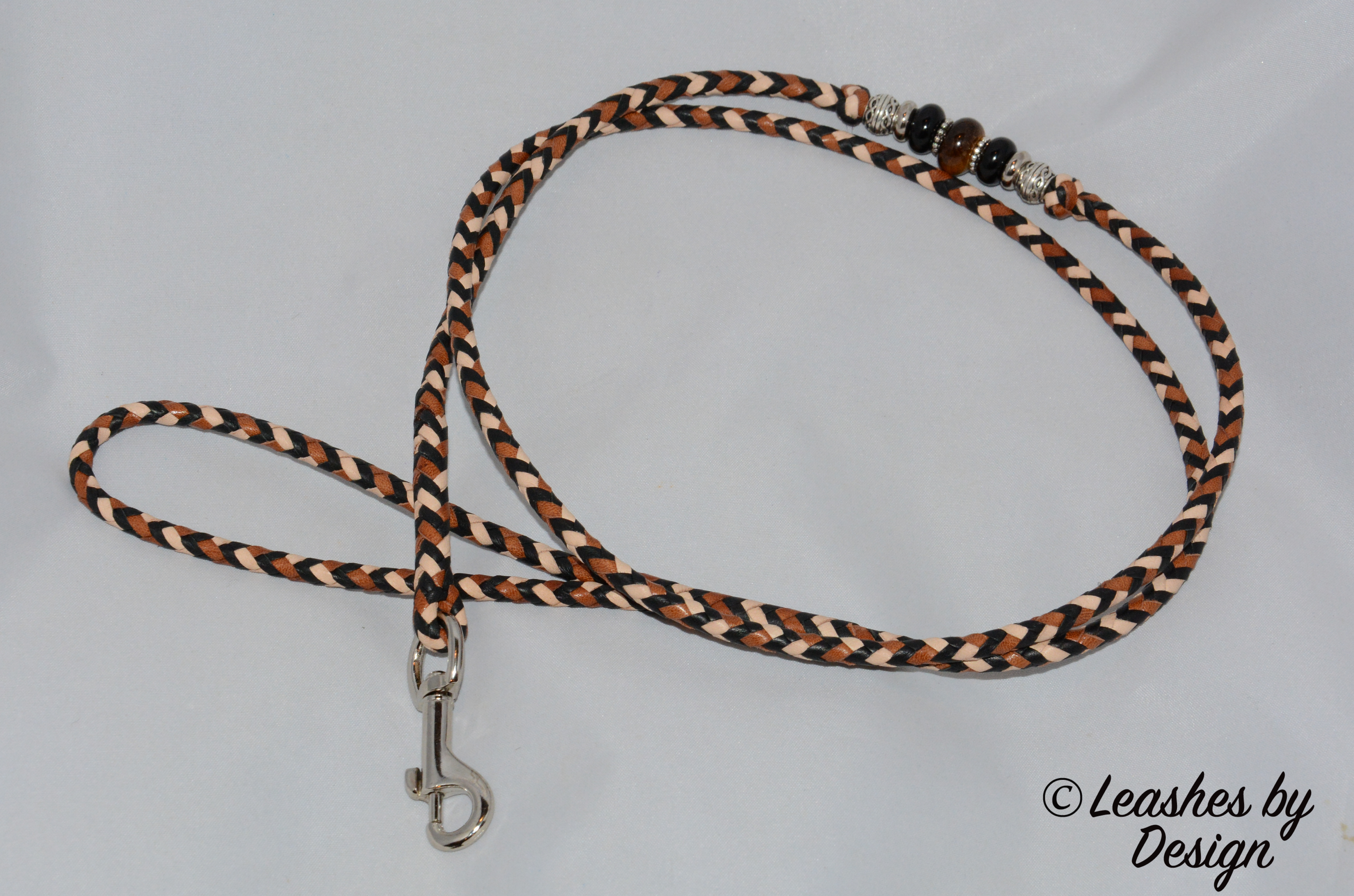  8 strands - black, whiskey and natural tan 